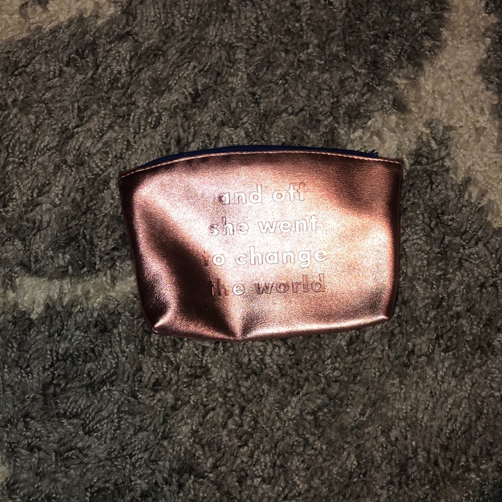 And off she went to change the world make up bag
